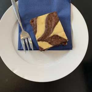 Chocolade Cheesecake bij Man met Bril Koffie